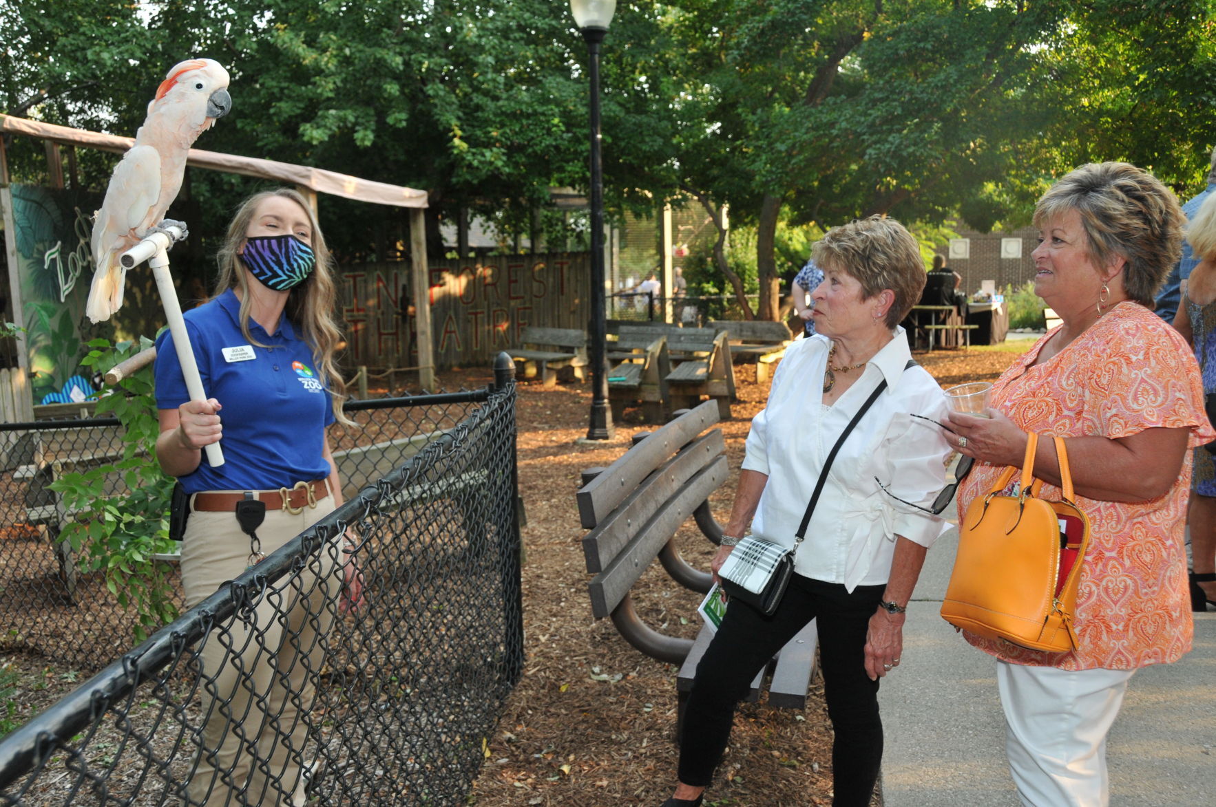Julia Benzel holding Henry while Judi Galloway and Traci Ayers look on